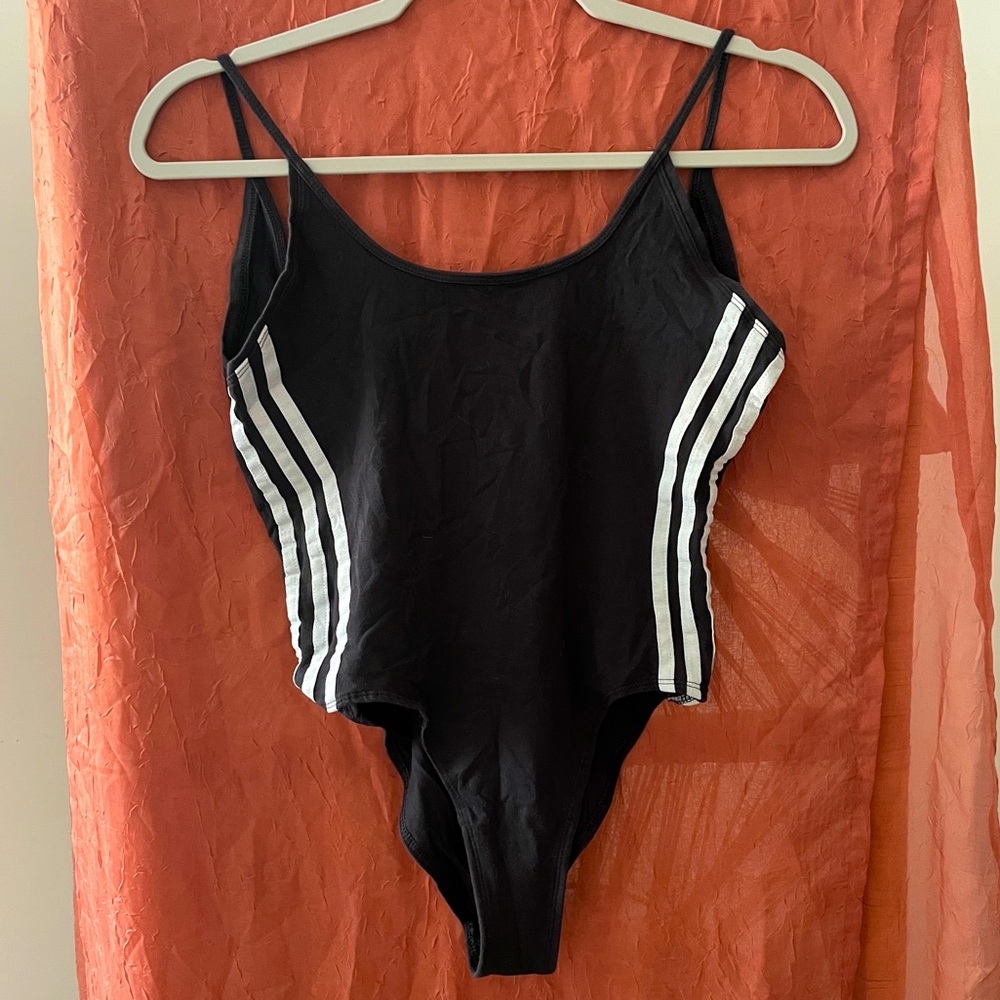 Adidas size small open back signature stripped bodysuit.